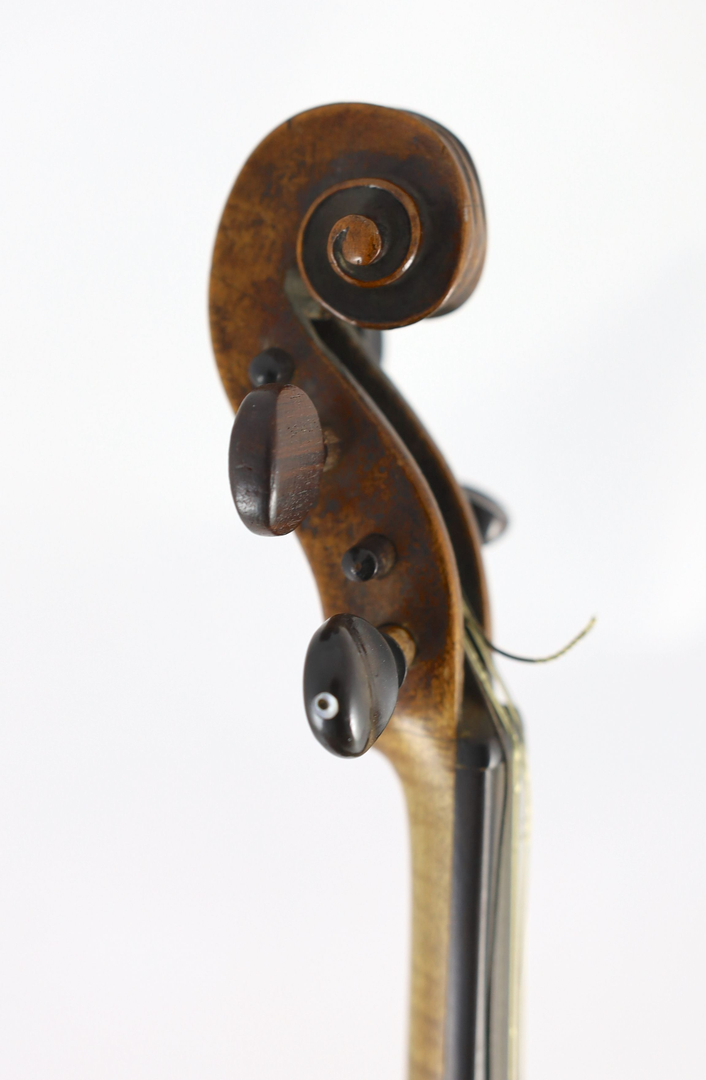 A 19th century violin, degraded internal paper label reads ‘Amati’, back measurement 36cm